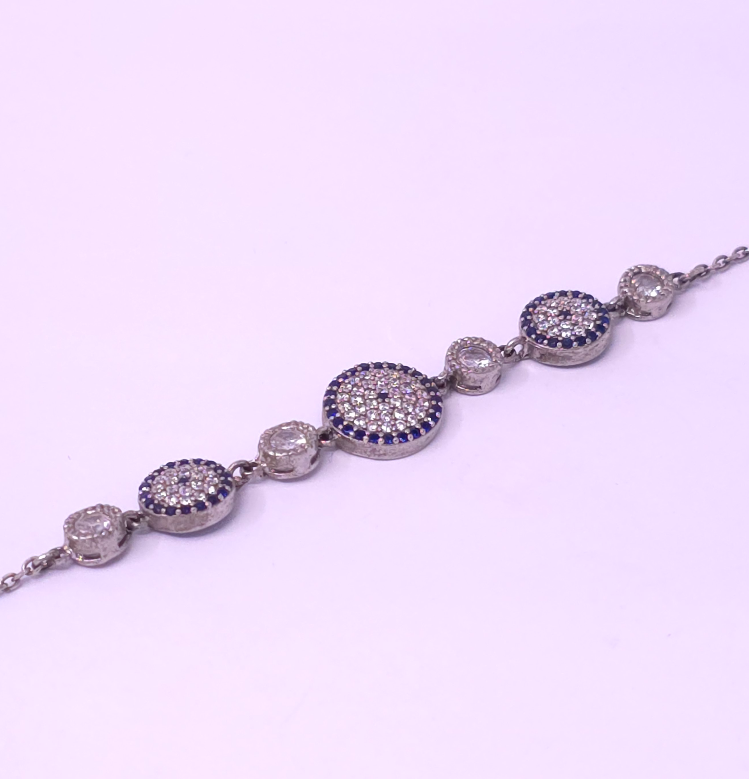 دستبند نقره طرح چشم نظر (آبکاری طلاسفید ۹۲۵ عیار)